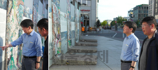 안철수(왼쪽) 국민의당 전 대표가 4일(현지시간) 같은 당 김경진 의원과 함께 독일 베를린장벽을 바라보고 있다. (사진 좌우)/사진=안철수 전 대표 트위터