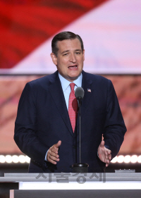 Senator Ted Cruz, a Republican from Texas, speaks during the Republican National Convention (RNC) in Cleveland, Ohio, U.S., on Wednesday, July 20, 2016. Donald Trump, a real-estate developer, TV personality, and political novice, was formally nominated as the 2016 Republican presidential candidate Tuesday night in Cleveland after his campaign and party officials quashed the remnants of a movement to block his ascension. Photographer: Daniel Acker/Bloomberg