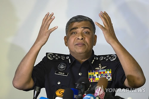 말레이시아 경찰은 이번 주중 김정남 암살 용의자인 리정철(46), 시티 아이샤(25), 도안 티 흐엉(29)을 기소할 방침이다./EPA=연합뉴스
