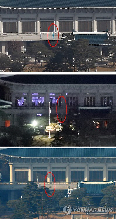 청와대는 박근혜 전 대통령에 대한 헌법재판소의 파면 선고가 내려진 10일 오후 청와대 본관에 게양된 봉황기를 내렸다. 첫번째 사진에는 10일 오전 9시 30분께 헌법재판소의 탄핵 선고 전 청와대 본관에 태극기 옆에 봉황기(붉은 원)가 걸려 있다. 아래의 사진에는11일 오후 청와대 본관 태극기 옆 깃대에 봉황기가 없다. /연합뉴스