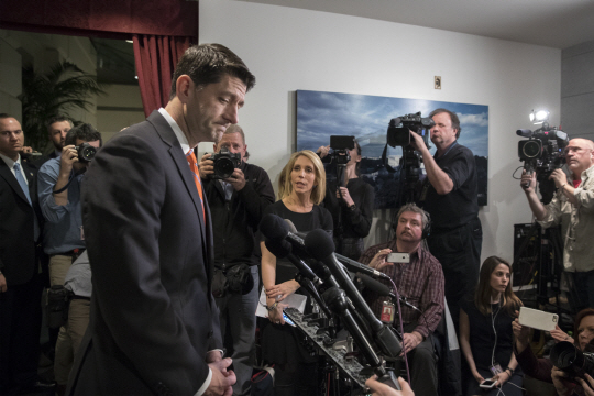 epa05866922 US Speaker of the House Paul Ryan (L) turns away from the microphones after delivering brief remarks to members of the news media following a Republican conference meeting on Capitol Hill in Washington, DC, USA, 23 March 2017. The House of Representatives has yet to vote on the American Health Care Act, the Republican bill to replace the Affordable Care Act. Republican leadership has so far failed to secure enough votes to overcome opposition from Democrats and from within their own 