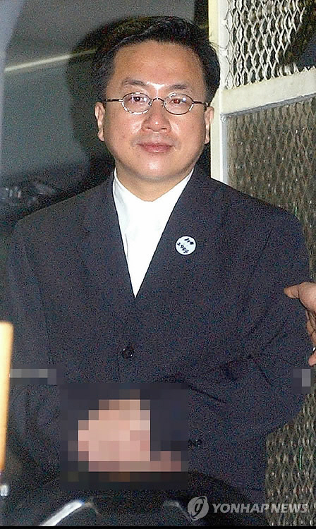 최규선, 순천서 도주 보름만에 체포…서울구치소로 압송 중