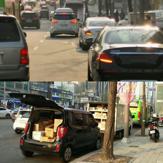 지난 21일 오후6시께 서울 강남구 도산대로에 번호판이 없는 신차나 트렁크를 열어둔 차량들이 불법 주정차돼 있다. /신다은기자