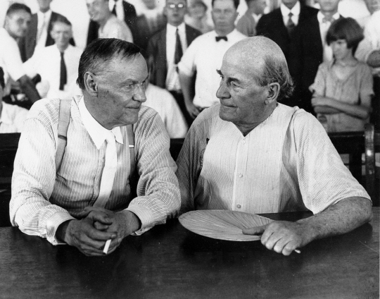 Clarence Darrow, left, and William Jennings Bryan speak with each other at the “monkey trial” in Dayton, Tenn. in 1925.  Darrow was one of three lawyers sent to Dayton by the American Civil Liberties Union (ACLU).  They defended John T. Scopes, a biology teacher, in his test of Tennessee‘s law banning the teaching of evolution.  Bryan testified for the prosecution as a bible expert.  (AP Photo)