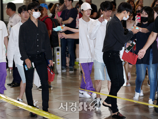 샤이니 민호, 팬의 작은 선물도 놓치지 않는 팬바보! (김포공항 출국)