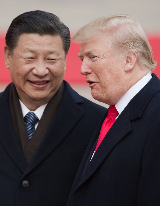 시진핑(왼쪽) 중국 국가주석과 도널드 트럼프 미국 대통령/베이징=AFP연합뉴스