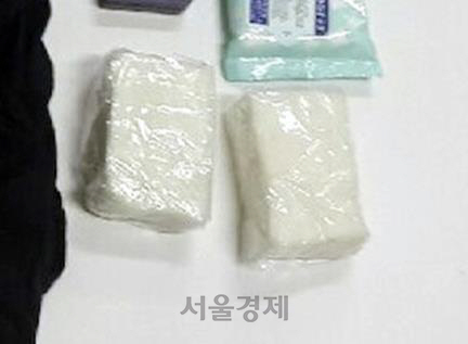 제천 참사로 숨진 이항자씨가 남편에게 주려고 챙겼다 유품으로 돌아온 백설기/류건덕씨 제공=연합뉴스