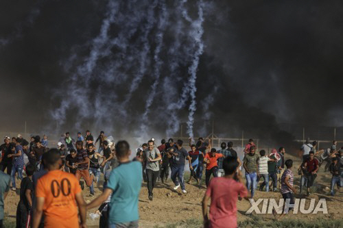 13일 가자지구 분리장벽 부근서 벌어진 팔레스타인의 시위/신화=연합뉴스