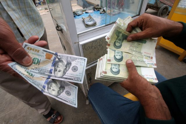미국 달러화와 이란 리알화 /로이터연합뉴스
