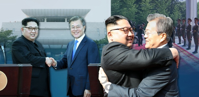 김정은 위원장과 문재인 대통령이 포옹을 하고 있다./연합뉴스