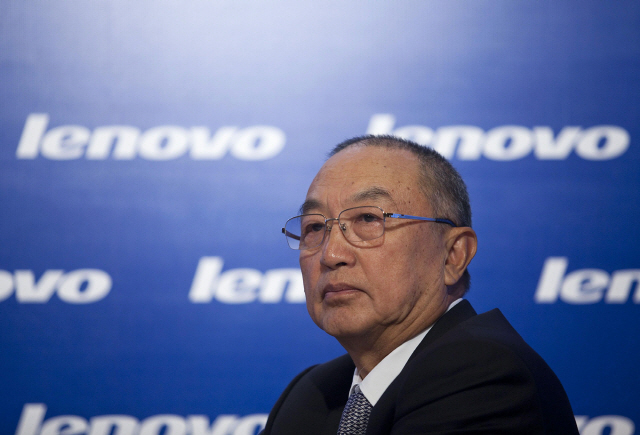 Liu Chuanzhi, chairman of Lenovo Group Ltd., pauses during a news conference to announce company results in Hong Kong, China, on Thursday, May 26, 2011. Lenovo Group Ltd. Chief Executive Officer Yang Yuanqing said demand for the company‘s LePad tablet computer is stronger than supply. Photographer: Jerome Favre/Bloomberg *** Local Caption *** Liu Chuanzhi