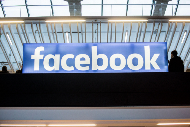 View of Facebook logo inside Station F, a mega-campus for startups located inside a former freight railway depot, in Paris, France, on Tuesday, Jan. 17, 2017. Facebook Inc. will open a startup incubator at Paris‘s soon-to-debut entrepreneur campus created by billionaire Xavier Niel, as Sandberg vows to keep investing in France. Photographer: Christophe Morin/Bloomberg