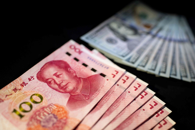 미국 달러화와 중국 위안화 /AFP연합뉴스
