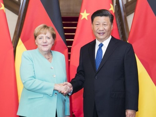 지난해 9월 베이징에서 만난 메르켈 총리와 시진핑 주석 /연합뉴스