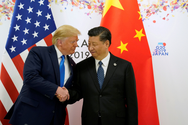 지난해 9월 일본 오사카에서 열린 G20 정상회의에서 만난 도널드 트럼프 미국 대통령과 시진핑 중국 국가주석. /로이터연합뉴스