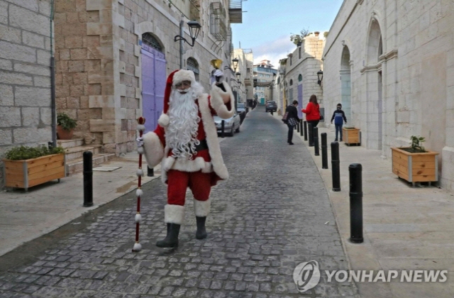 성탄절 앞두고 코로나19 봉쇄에 한적해진 베들레헴 거리./AFP=연합뉴스