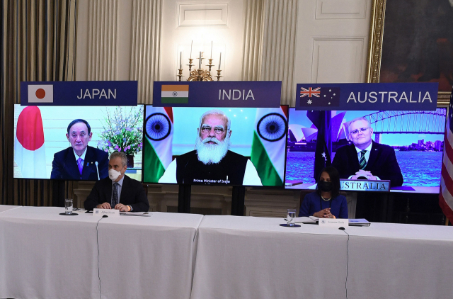 쿼드 화상회의에 참석한 스가 요시히데 일본 총리(왼쪽부터), 나렌드라 모디 인도 총리, 스콧 모리슨 호주 총리. /AFP연합뉴스
