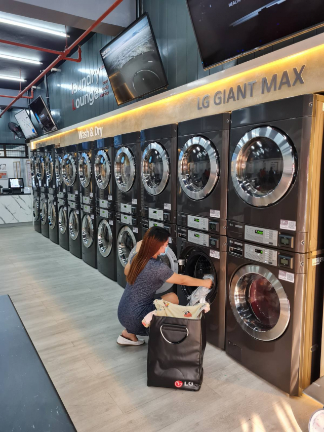 “상업용 세탁기 시장? 스마트 솔루션으로 뚫는다”  LG전자, 필리핀에 거점 확보