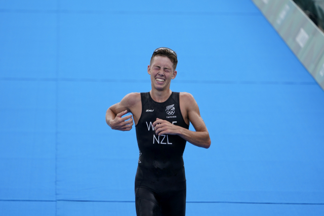 지난 26일 도쿄 오다이바 해상공원에서 열린 트라이애슬론 남자 개인전에 출전한 헤이든 와일드(23·뉴질랜드)는 1시간 45분 24초의 기록으로 동메달을 거머쥐었다./AP연합뉴스