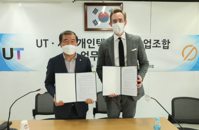 UT, 서울·인천 개인택시조합과 업무협약 체결…'상생 도모'