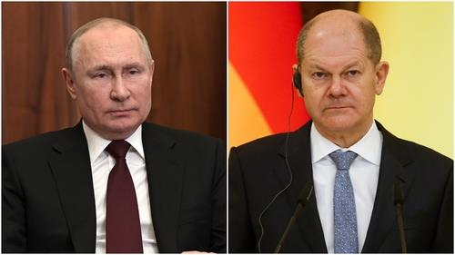 블라미디르 푸틴(왼쪽) 러시아 대통령과 올라프 숄츠 독일 총리. 타스연합뉴스