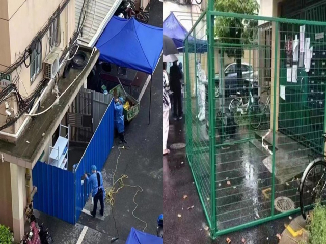 중국 방역당국 관계자들이 상하이의 한 아파트 입구에 철제 펜스를 설치하고 있다. 트위터 캡처