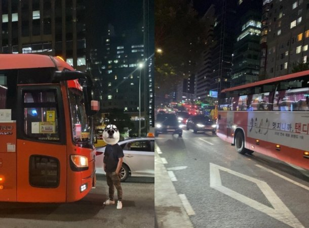 지난 6일 오후 9시 서울 강남대로에서 한 남성이 버스를 가로막고 서 있다. 온라인 커뮤니티 캡처