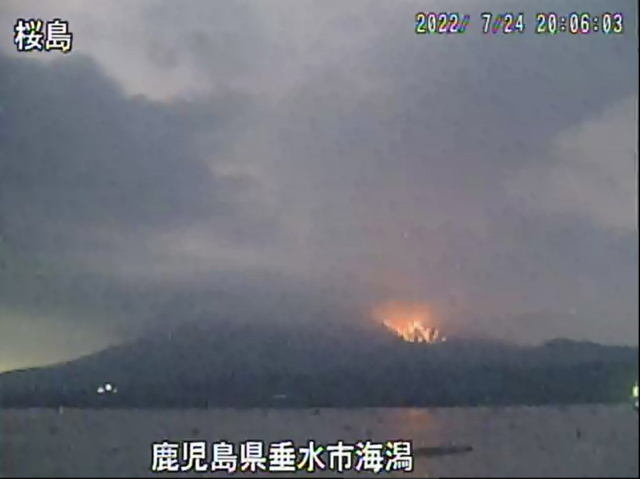 epa10090465 A surveillance camera image from the Osumi National Highway Office, Ministry of Land, Infrastructure, and Transport shows the eruption of the Sakurajima volcano in Kagosima, southwestern Japan, 24 July 2022 (issued 25 July 2022). The Japan Meteorological Agency said on 24 July it raised the alert to highest level of the five from the three on the five level scale after the eruption. EPA/Osumi National Highway Office, Ministry of Land, Infrastructure, JAPAN OUT EDITORIAL USE ONLY/