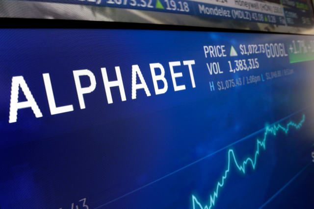 FILE - In this Feb. 14, 2018, file photo the logo for Alphabet appears on a screen at the Nasdaq MarketSite in New York. Alphabet reports earnings on Tuesday July 25, 2023. (AP Photo/Richard Drew, File) A FEB. 14, 2018, FILE PHOTO