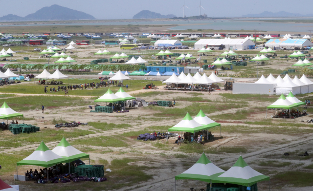 2023 새만금 세계스카우트 잼버리 대원들이 지난 8일 한산한 전북 부안군 잼버리 야영장을 떠나고 있다. 연합뉴스