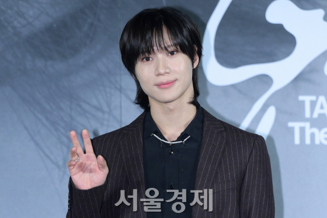 그룹 샤이니(SHINee) 태민이 30일 오후 서울 성동구 메가박스 성수에서 진행된 미니 4집 ‘길티(Guilty)’ 발매 기념 기자간담회에서 포즈를 취하고 있다. 김규빈 기자