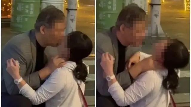 대만 정보기관 '국가안전국' 고위 간부인 셰징화가 강제 키스하는 장면. 사진=대만 TVBS 뉴스 캡처
