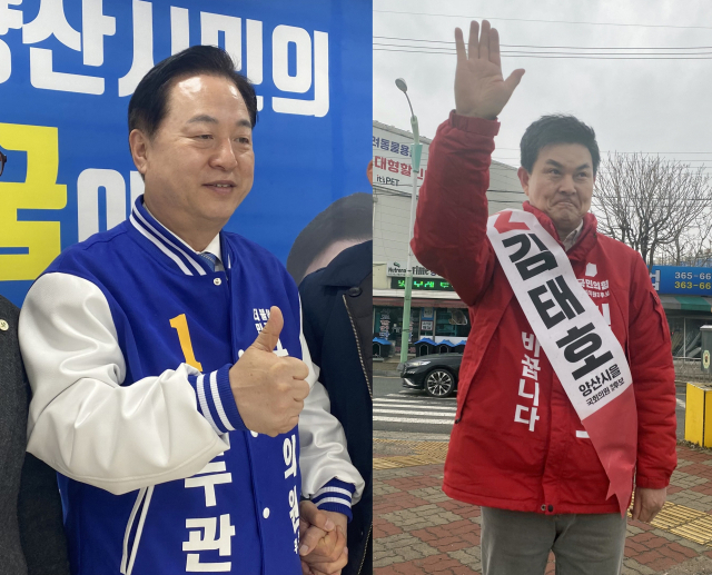 김두관(왼쪽) 더불어민주당 후보와 김태호 국민의힘 후보. 연합뉴스