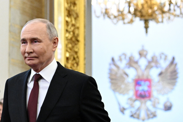 블라디미르 푸틴 러시아 대통령 당선인이 7일 모스크바 크렘린궁에서 열리는 취임식에 참석했다.AFP연합뉴스