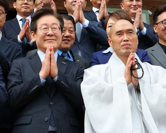 부산행 이재명 '정권 심판해달라'…단일화 회동은 불발