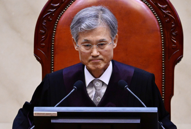 조희대 대법원장이 1일 서울 서초구 대법원에서 열린 이재명 더불어민주당 대선 후보의 공직선거법 위반 사건 상고심 선고에 참석, 입술을 다물고 있다. 연합뉴스