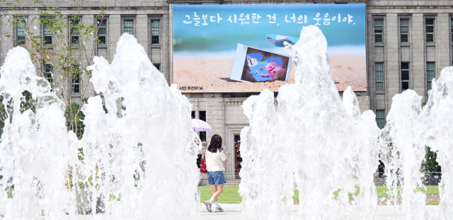 서울에 첫 폭염주의보…내일도 푹푹 찌는 무더위