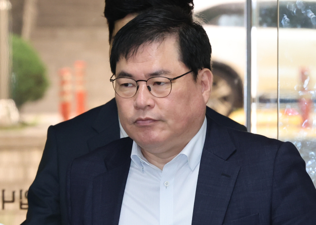 유동규 전 성남도시개발공사 기획본부장이 30일 서울 서초구 서울중앙지법에서 열린 대장동 개발 의혹 관련 1심 결심 공판에 출석하고 있다. 연합뉴스