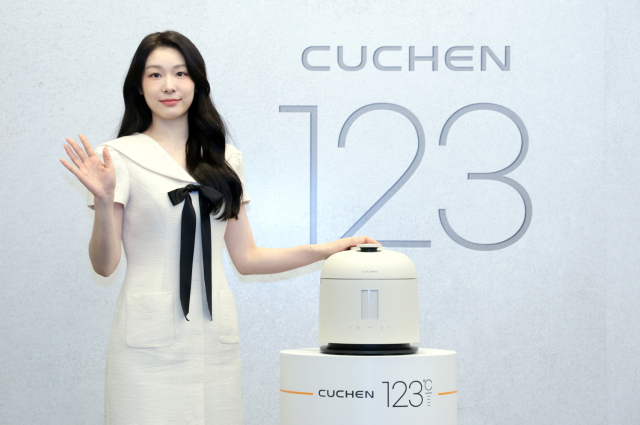 쿠첸 광고모델인 김연아 전 피겨스케이팅 선수가 21일 서울시 강남구 인터컨티넨탈 서울 파르나스에서 열린 쿠첸 ‘123 밥솥’ 출시 기념 미디어데이에 참석했다. 사진 제공=쿠첸