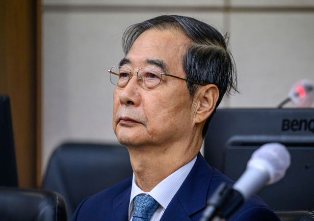 한덕수 전 국무총리가 30일 서울 서초구 서울중앙지법에서 열린 내란 우두머리 방조 및 위증 등 혐의 재판에 피고인으로 출석하고 있다. 사진공동취재단